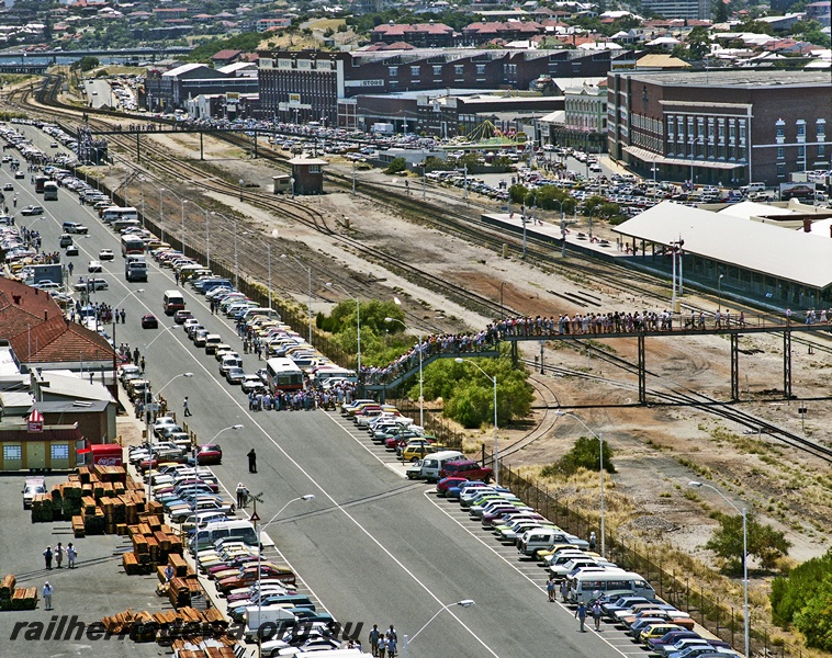 P15853
Yard, signal box, footbridges, track leading into Victoria Quay, Fremantle Wharf Harbour, crowds on the footbridges for the arrival in the harbour of the 