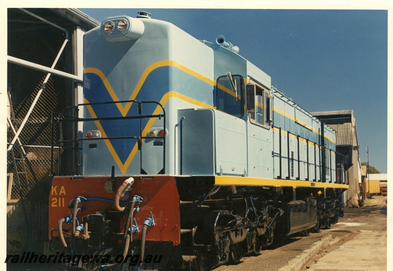 P15871
KA class 211, in light blue with dark blue and yellow stripe livery, front and side view

