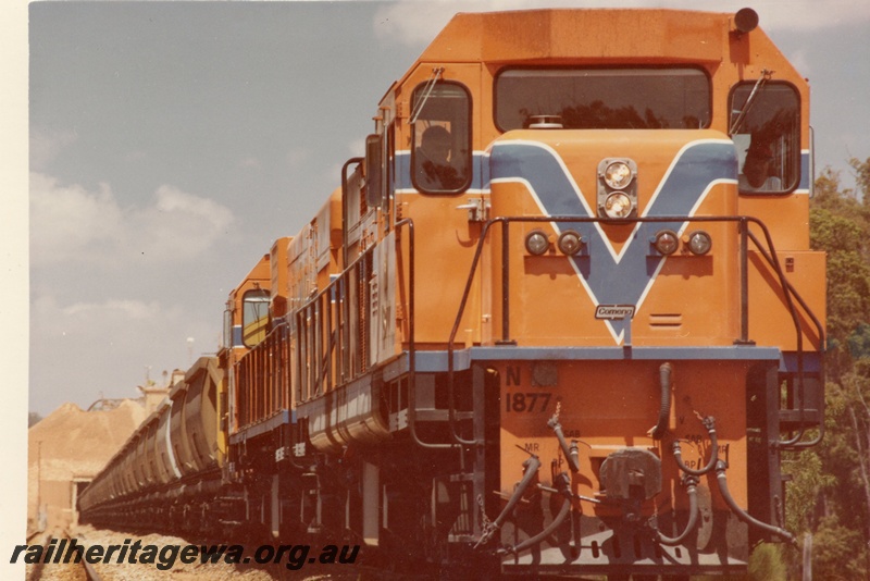 P15896
N class 1877 and another diesel loco, in Westrail orange with blue and white stripe, double heading goods train, partial side and front view
