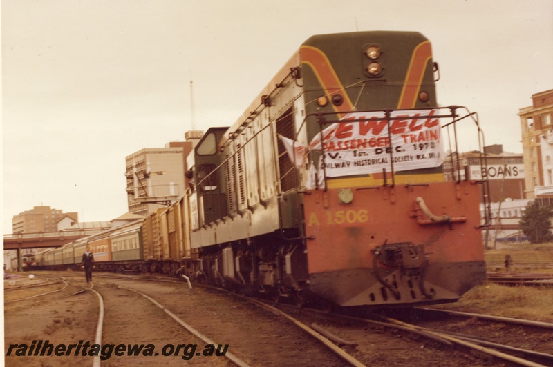 P15907
A Class 1506, green livery with red and yellow stripe, 