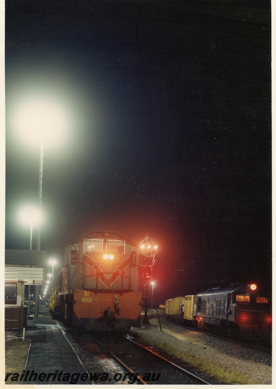 P15924
M class 1851, X class diesel, both in green with red and yellow stripe livery, yellow vans, signal lamps, light towers, Forrestfield Hump Yard, at night, side and front views
