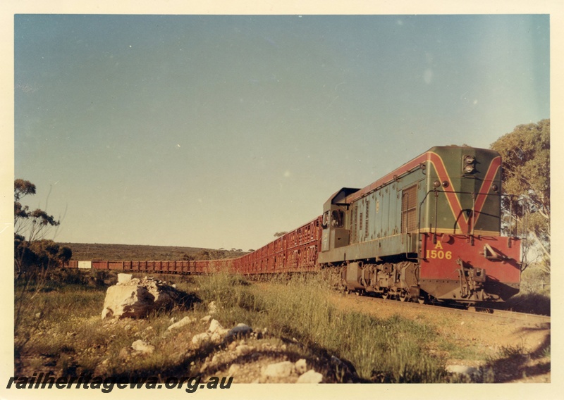 P15942
A class 1506, in green with red and yellow stripe, on the 