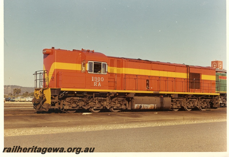 P15946
RA class 1910, in International safety orange with yellow stripe, end and side view, short end closest to camera
