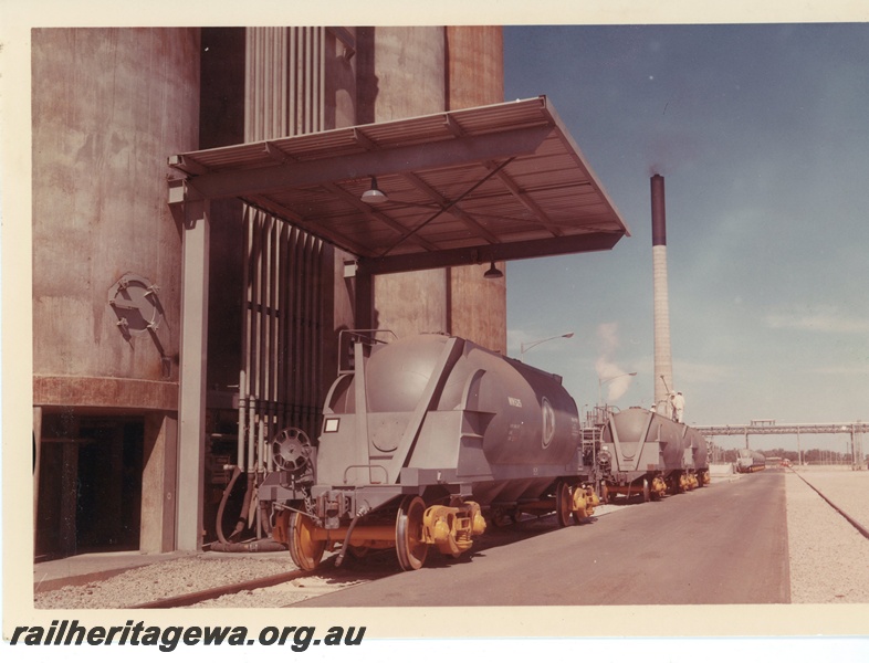 P15955
WN class 525 nickel concentrate tanker, other WN class tankers, Western Mining plant, Kwinana, end and side view 
