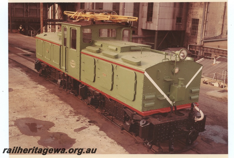 P15987
State Energy Commission class 1 electric loco, in green with red and white stripe livery, East Perth power station, side and front view
