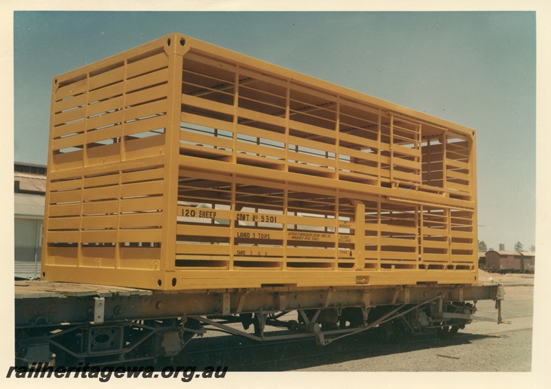 P16018
Sheep container no 5301, yellow, on flat bed wagon, end and side view
