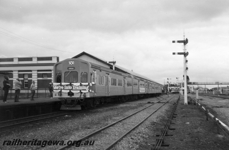 P16091
A two car ADL/ADC railcar suburban awaiting departure from Fremantle after the suburban line was reopened to rail traffic. Semaphore signals are evident as is the overhead footbridge.
