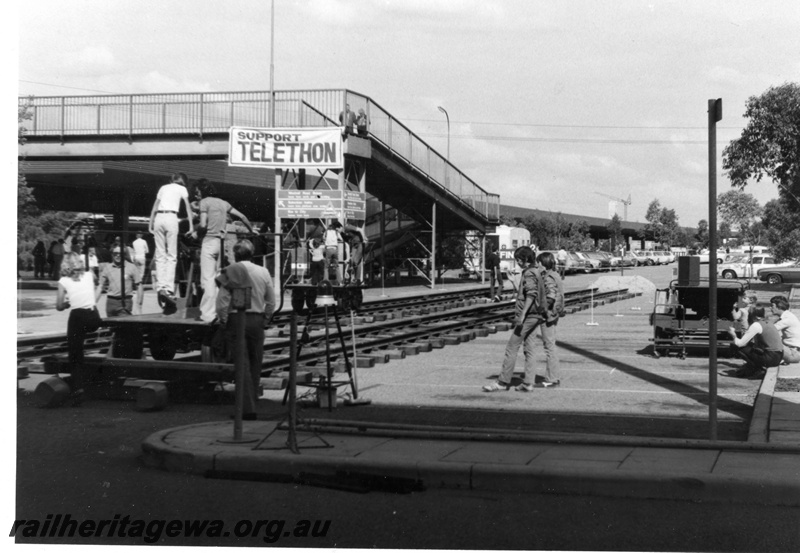 P16095
Kalamazoo races being held in the car park at Perth Terminal as part of the Telethon event. The footbridge has been revamped in the past years.
