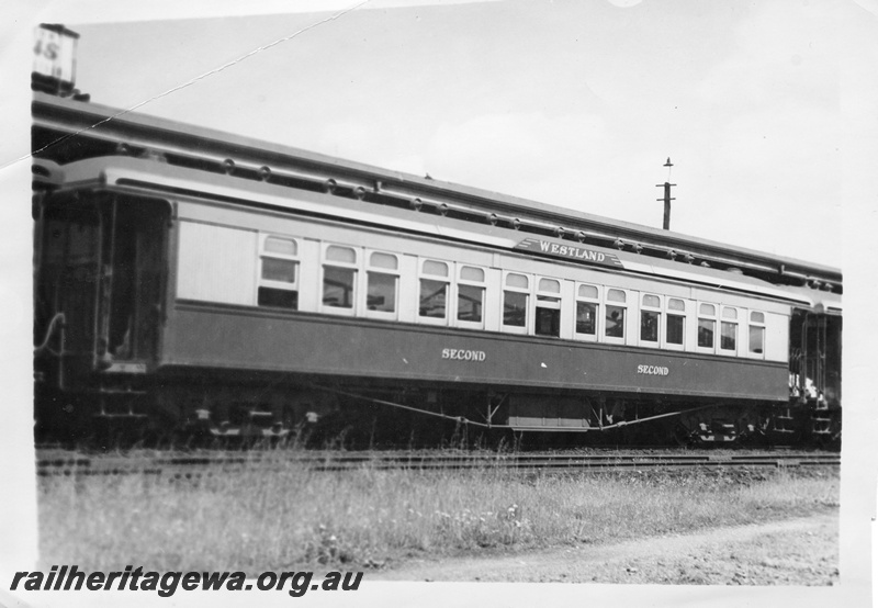 P16100
An early 2nd class sleeping car, with the Westland sideboard pictured at Kalgoorlie Station.
