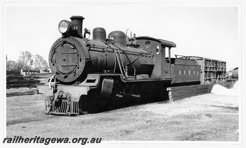 P16118
MRWA D class 20 steam locomotive at the head of a goods train. Front and side view of locomotive.
