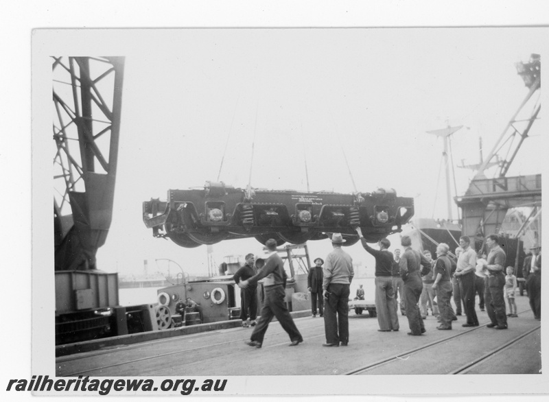 P16125
2 of 6 images of an MRWA F class diesel being unloaded from a ship by the floating crane 