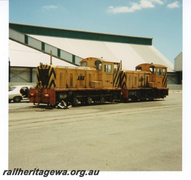 P16134
Ex TGR and ANR V class 5 and V class 4 in yellow livery, for the Hotham Valley Railway, North Fremantle, front and side view
