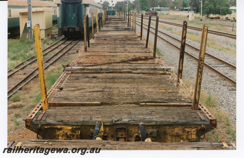 P16145
QU class bogie flat wagons, Pinjarra, SWR line, view along the decks
