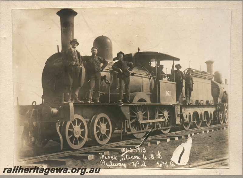 P16186
Commonwealth Railways (CR), D class 161, formerly Q class, railwaymen on board, first loco in WA on TAR line, front and side view
