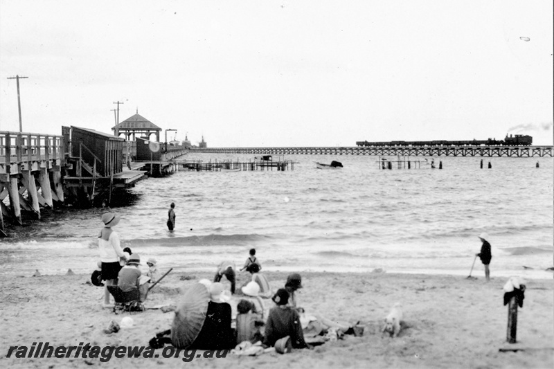 P16117
G class pushing a rake of wagons along the approach jetty to the jetty at Busselton, view from the shorelines
