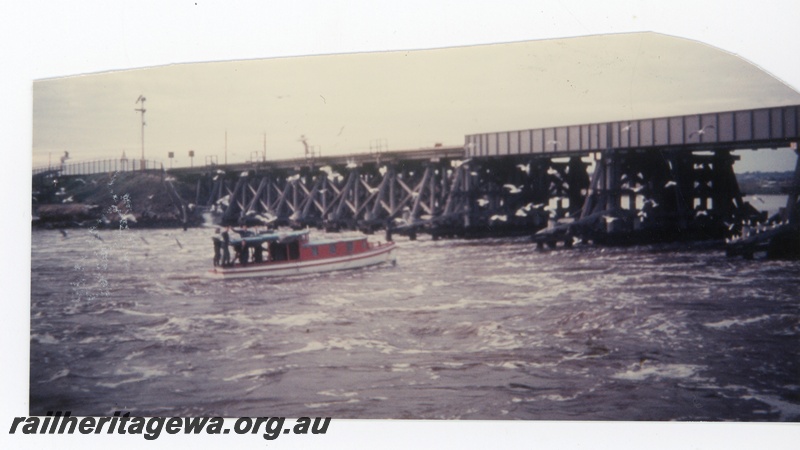 P16229
Rail bridge of wood and steel, boat about to pass under, Swan River, Fremantle, ER line.
