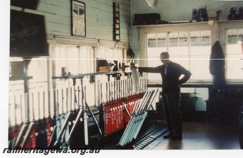 P16247
Interior of signal Box C Perth, frame containing 85 levers, signalman, Perth city station
