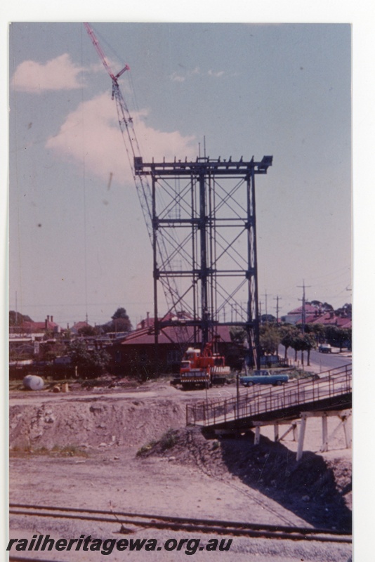 P16273
The Summers Street water tower stand at East Perth as demolition takes place as part of the standard gauge passenger terminal development.
