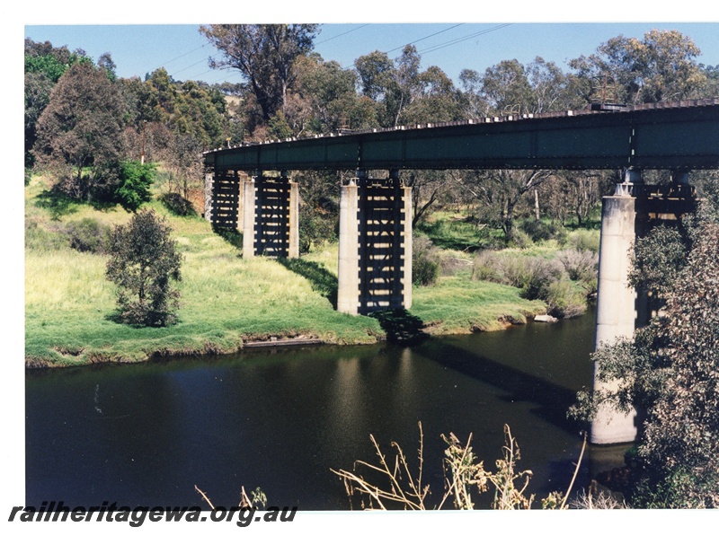 P16279
4 of 5. Another view of the steel girders supporting the rail and sleepers. Also of note is the pylons supporting the bridge.
