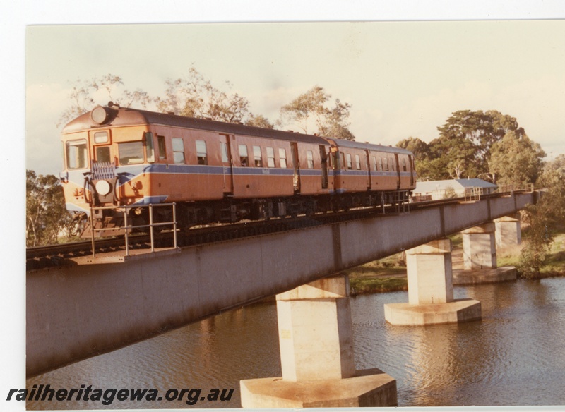 P16338
ADG class railcar set, on concrete and steel bridge, crossing Swan River, Guildford, ER line, end and side view
