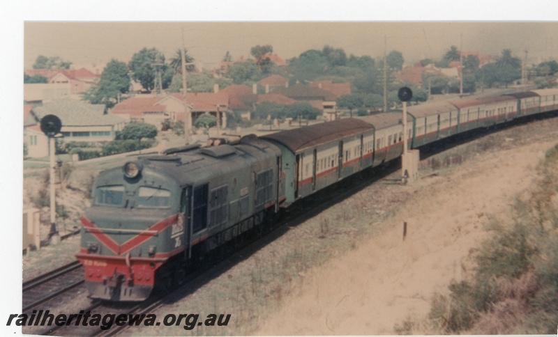 P16358
XB class 1015, in green with red and yellow striped livery, on suburban passenger train, light signals, Mount Lawley, ER line
