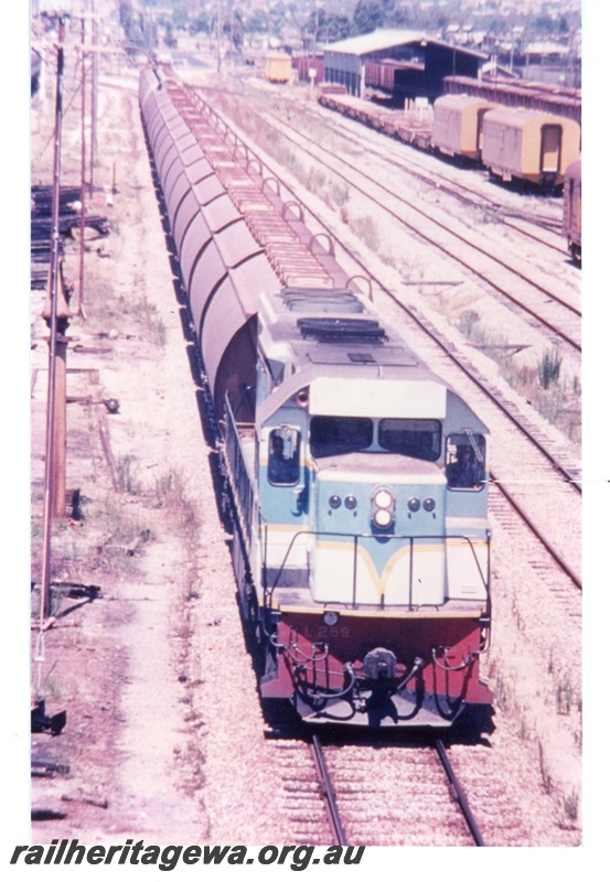 P16389
L Class 259, in blue and grey livery with yellow stripe, on grain train, livestock wagon washout shed, Midland, ER line, elevated view
