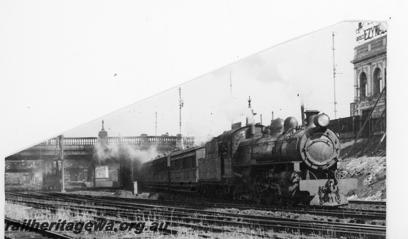 P16398
PR class loco, on passenger train, leaving Perth station, Barrack Street bridge, trackside view
