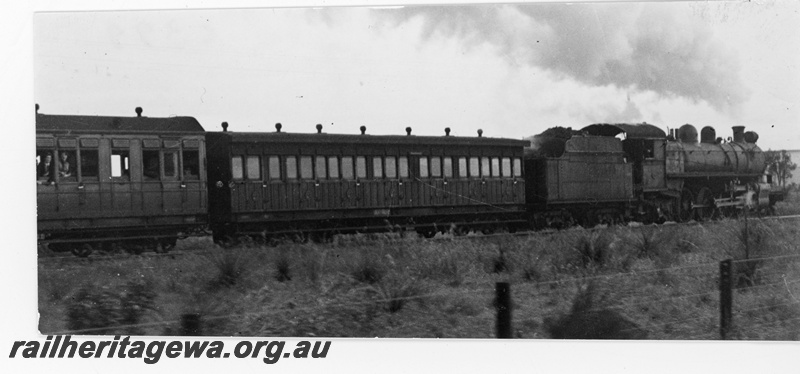 P16399
P class loco on passenger train including AP class carriage, side view
