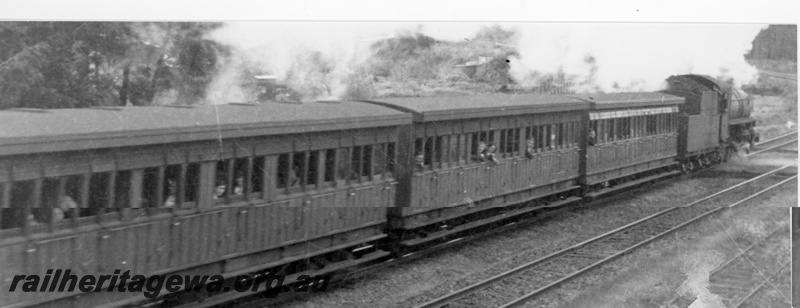 P16412
Steam loco hauling hike train with side entry coaches, Parkerville, ER line
