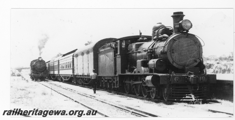 P16460
Commonwealth Railways (CR) G class 19, on passenger train, C class loco, Karonie, TAR line, side and front view, c1932
