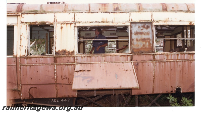 P16494
ADE class 447, in derelict condition, with man inside, side view (part only)
