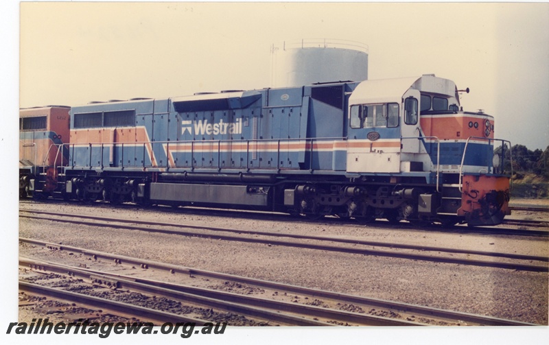 P16524
L class 268, in blue and white livery with orange and white stripes with Westrail tooth logo, side and end view
