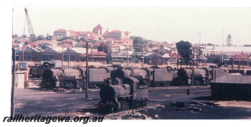 P16529
Loco depot, various steam locos, crane, houses, East Perth 
