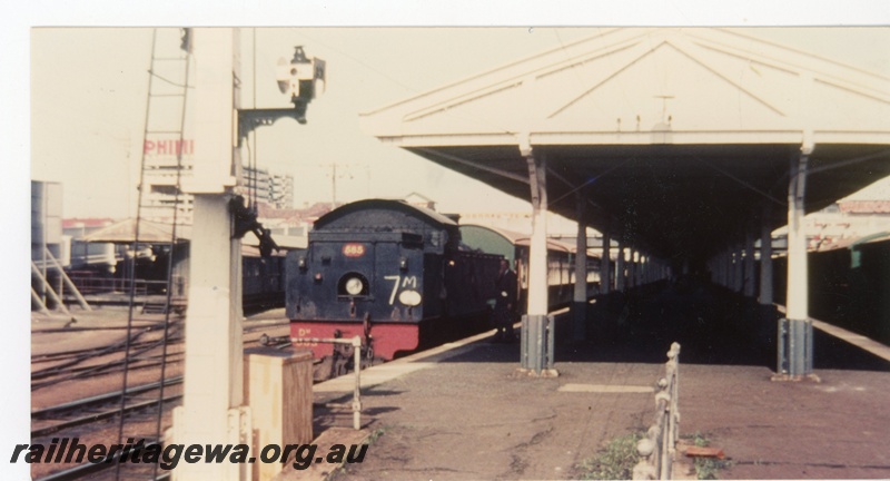 P16550
DM class 585, on passenger train, signal post, canopy, platform, Perth station, rear and side view
