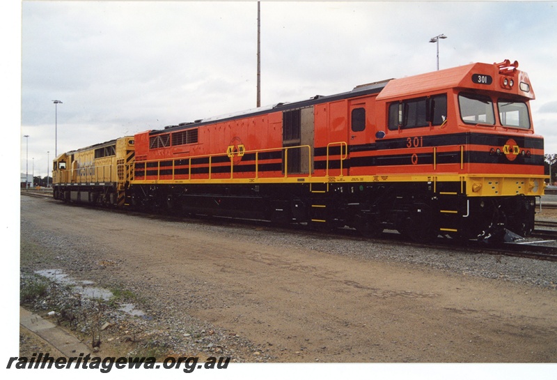 P16590
Q class 301, in AW livery, another diesel loco in Westrail livery, Forrestfield loco depot, side and front view
