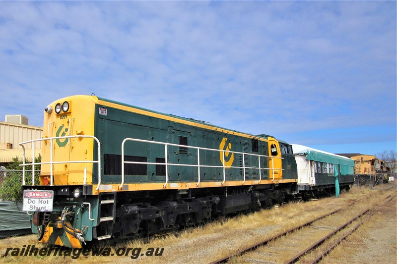 P16619
1 of 3 images of PTA U class 201, in Coote Industries livery, Bassendean loop, end and side view, long end to camera
