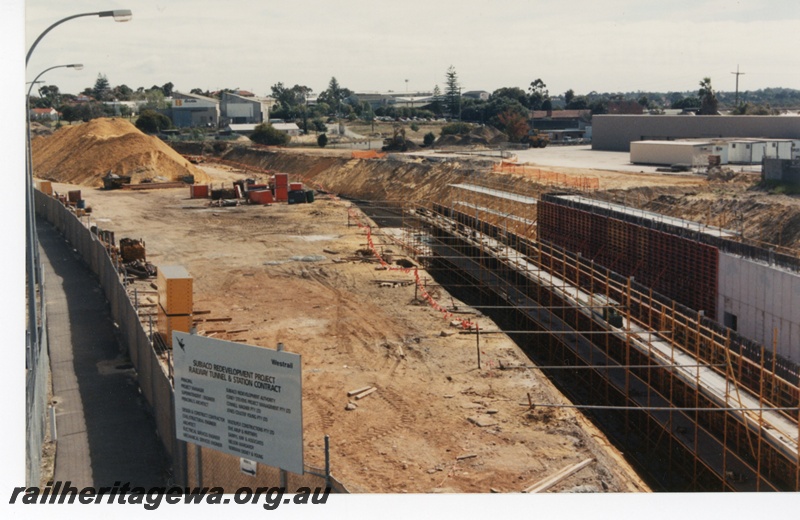 P16650
Site of the sinking of the Perth to Fremantle railway line at Subiaco, Subiaco Redevelopment Project, ER line, elevated view of tunnel under construction
