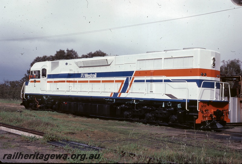 P16652
L class 268, in white orange and blue livery, with Westrail tooth logo, side and end view
