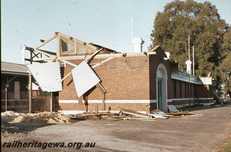 P16656
1 of 2 images of station building, Guildford, ER line, being demolished, ground level view
