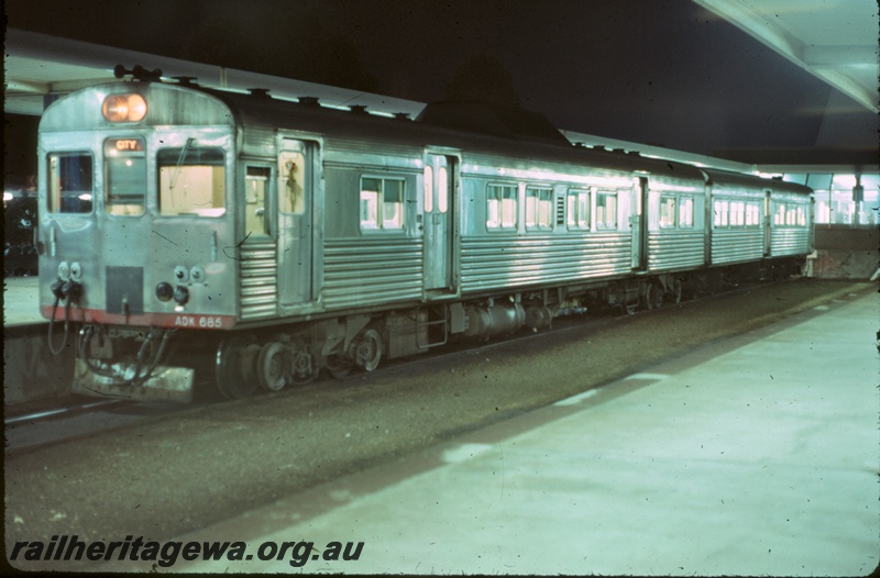 P16660
ADK class 685 rail car, with another car, about to depart for the city, platforms, roof, Midland station, ER line, front and side view
