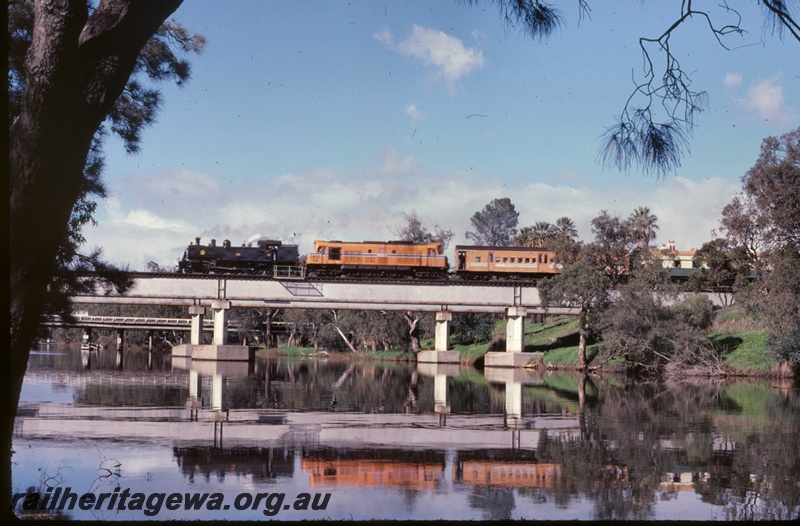 P16665
DD class loco, XA class loco, double heading excursion train, crossing Swan River on concrete and steel bridge, Guildford, ER line, side on view
