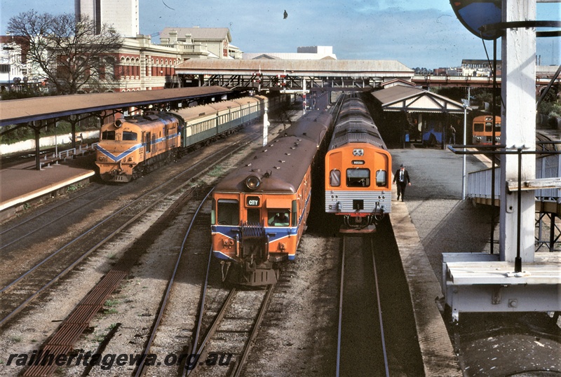 P16667
Overview of old Perth city station, with four trains standing at various platforms, including X class 1005 