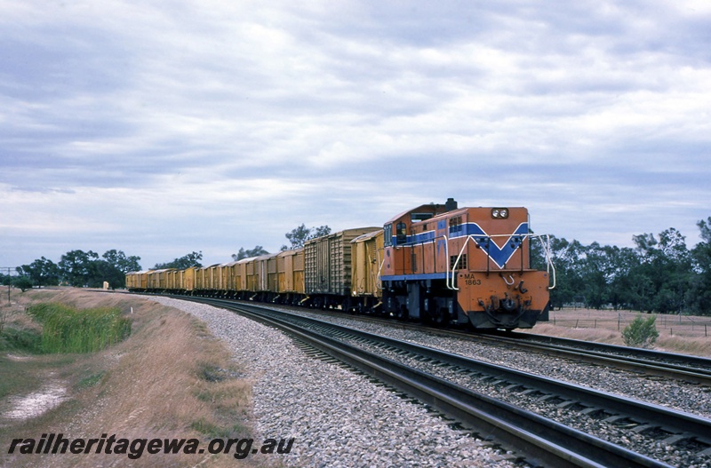 P16720
Westrail MA class 1863, Westrail orange livery, Beckenham, Forrestfield - Cockburn Junction line, goods train, beer loaded in louvre vans at Swan Brewery, Canning Vale.
