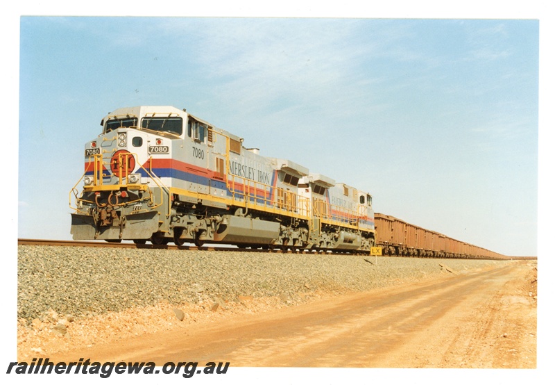 P16762
Hamersley Iron (HI) C-44W class 7080 & 7070 hauling an ore train 7 Mile, Dampier.
