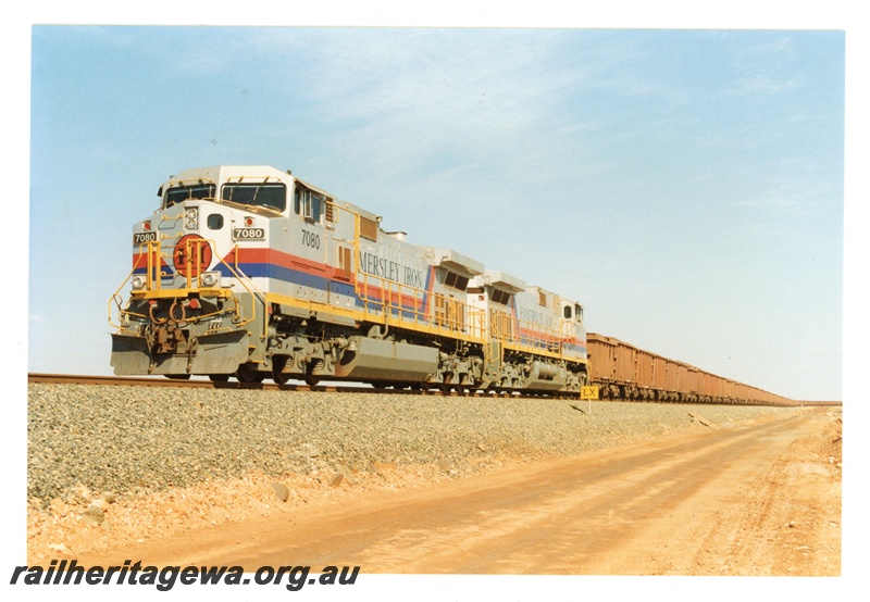 P16762
Hamersley Iron (HI) C-44W class 7080 & 7070 hauling an ore train 7 Mile, Dampier.
