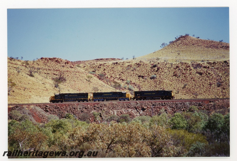 P16763
Hamersley Iron (HI) SD50 class & M636 class side view of locomotives.
