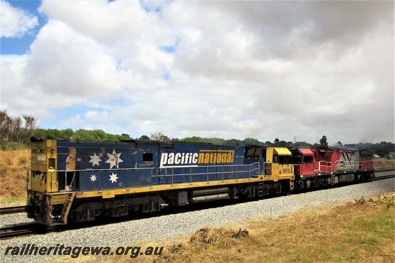 P16789
Pacific National loco NR class 16 towing Mineral Resources loco MRL class 001 towards Forrestfield through Hazelmere
