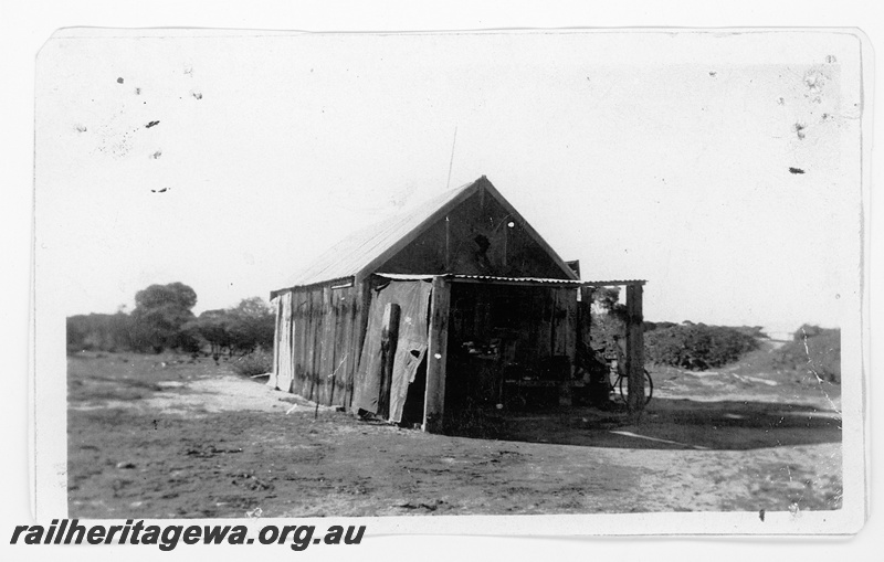 P16793
Sleeper hut used by the loco cleaners at Amery, GM line, built in 1928, side and front view, c1948

