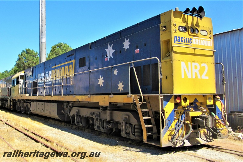 P16794
National Rail NR class 2 passing through the site of the Rail Transport Museum on its way to UGL's site, Bassendean, side and end view
