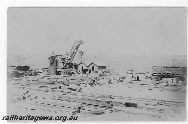 P16816
Commonwealth Railways (CR) - TAR line steam crane being used in the construction of building at an Unknown location. c1916
